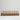 Long wood candle taper holder with 17 burning candles.