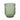 A green embossed drinking glass with floral patterns.