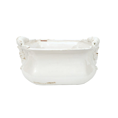 Vintage inspired bowl with detailed handles in a distressed white finish. 