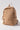 Soft, quilted nylon backpack in tan by Shiraleah.
