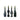 Four wine bottles with decorative green candles on a white background