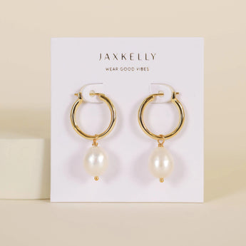 JaxKelly classic pearl drop hoop earrings.