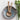 A set of Mango Wood Salad Servers with Scalloped Handles resting on a stoneware platter next to fresh garden greens.