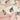Close up of the Pink Heron Short Kimono pattern, showing white herons surrounding each other on a pale pink background.