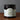 Los Poblanos Lavender and Peppermint Blue Corn Body Scrub in an amber glass jar.
