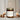 Vanilla Bean Noel scented soy wax candle in an amber glass jar with gold metal lid.