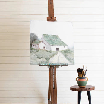 Hand painted oil barn on canvas sitting on an easel