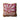 Square cotton tufted pillow with pink flowers and fringe.