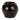 Round black ceramic pot with a glossy finish, featuring four small curved handles near the rim. The handcrafted texture is visible, with subtle variations in the glaze and small speckles on the surface.