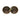 Rustic stoneware double dish with an organic, hand-formed handle connecting two round bowls. The glaze features earthy brown and black tones with a slightly mottled finish, giving it a handcrafted, artisanal look.