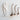 Set of three handcrafted wooden ladles with curved handles and deep bowls, arranged in ascending size on a textured white surface. A soft cotton drawstring bag with an illustration of the ladles and "Wooden Ladle Set" text is placed beside them.