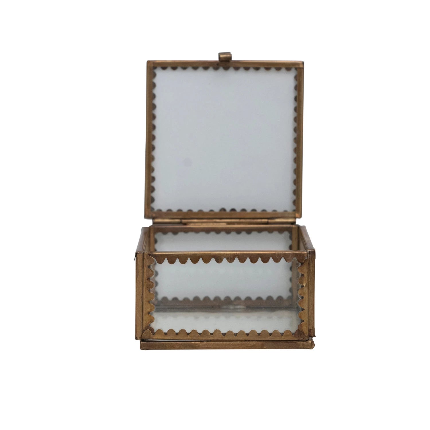 Open view of the brass and glass display box with scalloped edges.