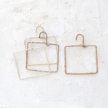 Four small square wire & natural fiber wrapped hangers.