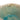 Close-up of a stoneware measuring cup with an aqua crackle glaze, showing the "1 CUP" measurement marking etched on the rim. The textured glaze features a blend of blue and green tones with an organic, handcrafted look.