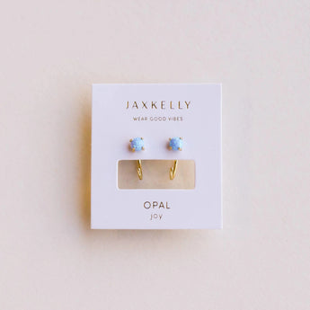 JaxKelly opal joy huggies earrings. 