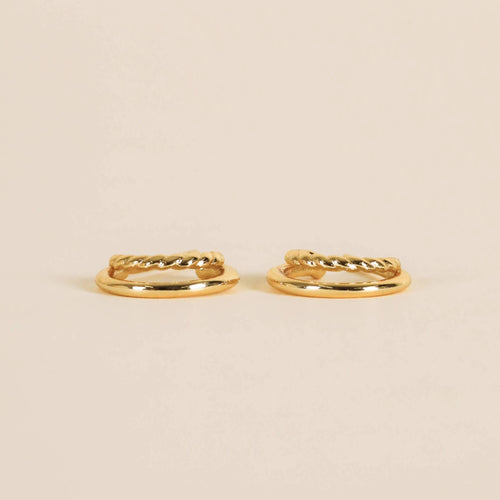 Side view of gold double hoop earrings.