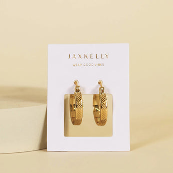 JaxKelly textured gold plated hoop earrings. 