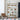 Various antique glass wine bottles staged in a wooden bookcase.