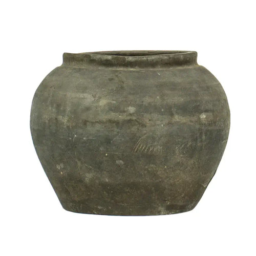 A matte black clay pot.