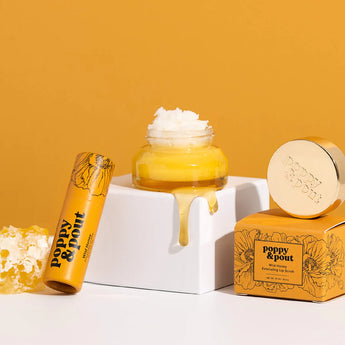 Wild Honey lip balm and lip scrub with honeycomb and drizzled honey. 