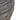 Wood barrel with metal rings.