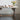 Reclaimed wood dining table with fresh bread and flowers ontop.