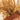 Natural sea oats in a terracotta vase.
