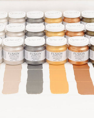 Fusion Mineral Paint Metallic Paints in a row with a paint swatch of each colour.