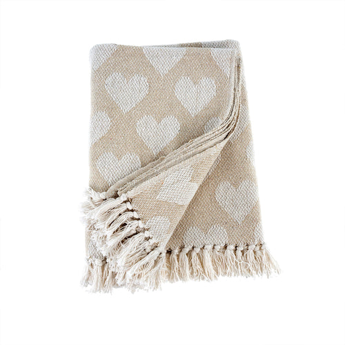 Natural coloured woven throw with white hearts and fringe detail. 