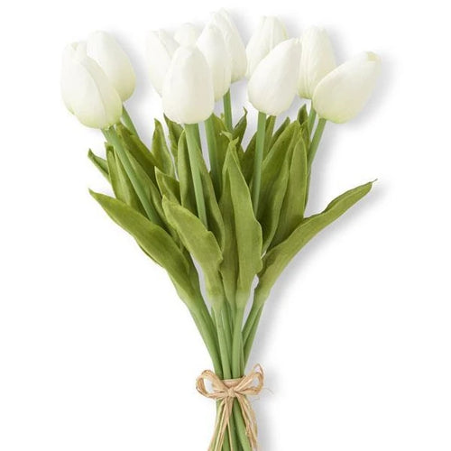 A bundle of white miniature tulips wrapped with brown paper ribbon for Easter. 