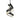 Pair of black and white ice skates hanging against a white background