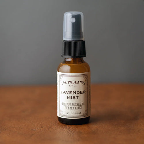 Los Poblanos Lavender Mist in an amber glass bottle with black mister. 