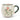 White mug with green handle and festive design of red bow and greenery on a white background