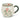 Ceramic mug with Christmas design featuring bows and mistletoe on a white background