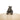 Front of the Brown Hanging Rabbit hanging off the side of a cream coloured pot.