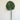Artificial green leaf on a white background