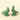 Two small bird figurines with a distressed green patina finish, standing on a light beige background.