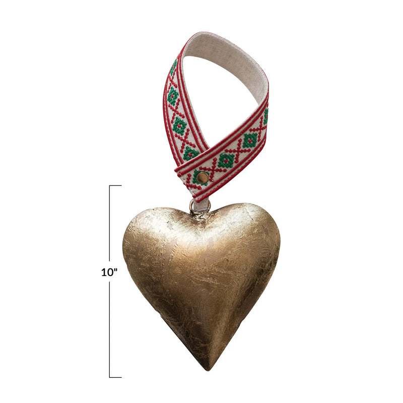 Gold heart measures 10-inches high and has a Scandinavian inspired embroidered hanger. 
