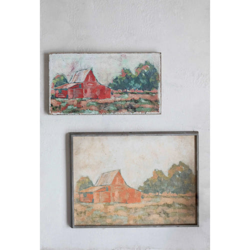 Set of barn prints hung on a wall. 