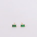 Emerald green and gold baguette stud earring.