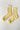 Pair of yellow socks with white stripes and blue text on a light gray background