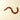 A string of amber-brown heart-shaped beads or charms laid out in a curved line on a plain cream background.