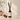 An amber glass reed diffuser bottle with a white label reading 'C&T Candle Co. Strawberry No. 10'