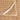 Close-up of a textured beige towel with a white cotton ribbon for hanging.