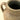 Close-up of a brown ceramic vase with a handle on a beige background