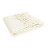 Woven Cotton Throw with Crochet and Fringe in colour cream laying flat. 