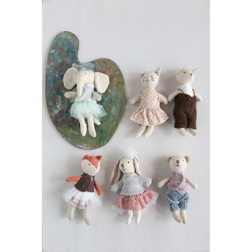 Plush animals dressed in clothing. 