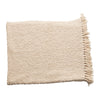 Cotton Blend Boucle Throw with Fringe in color cream folded.