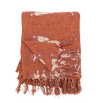 Bohemian inspired cotton blend tie-dyed throw with tassels.