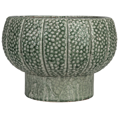 The Embossed Footed Vase / Planter has a dot pattern and is finished in a green crackle glaze. 